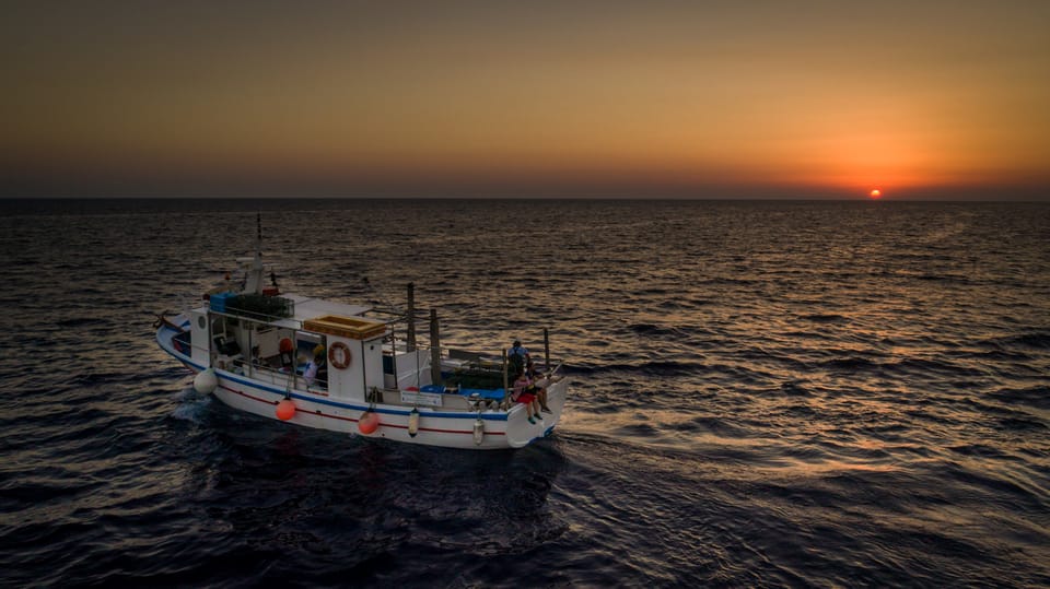  Santorini Sunset Fishing Trip with Dinner and Drinks 